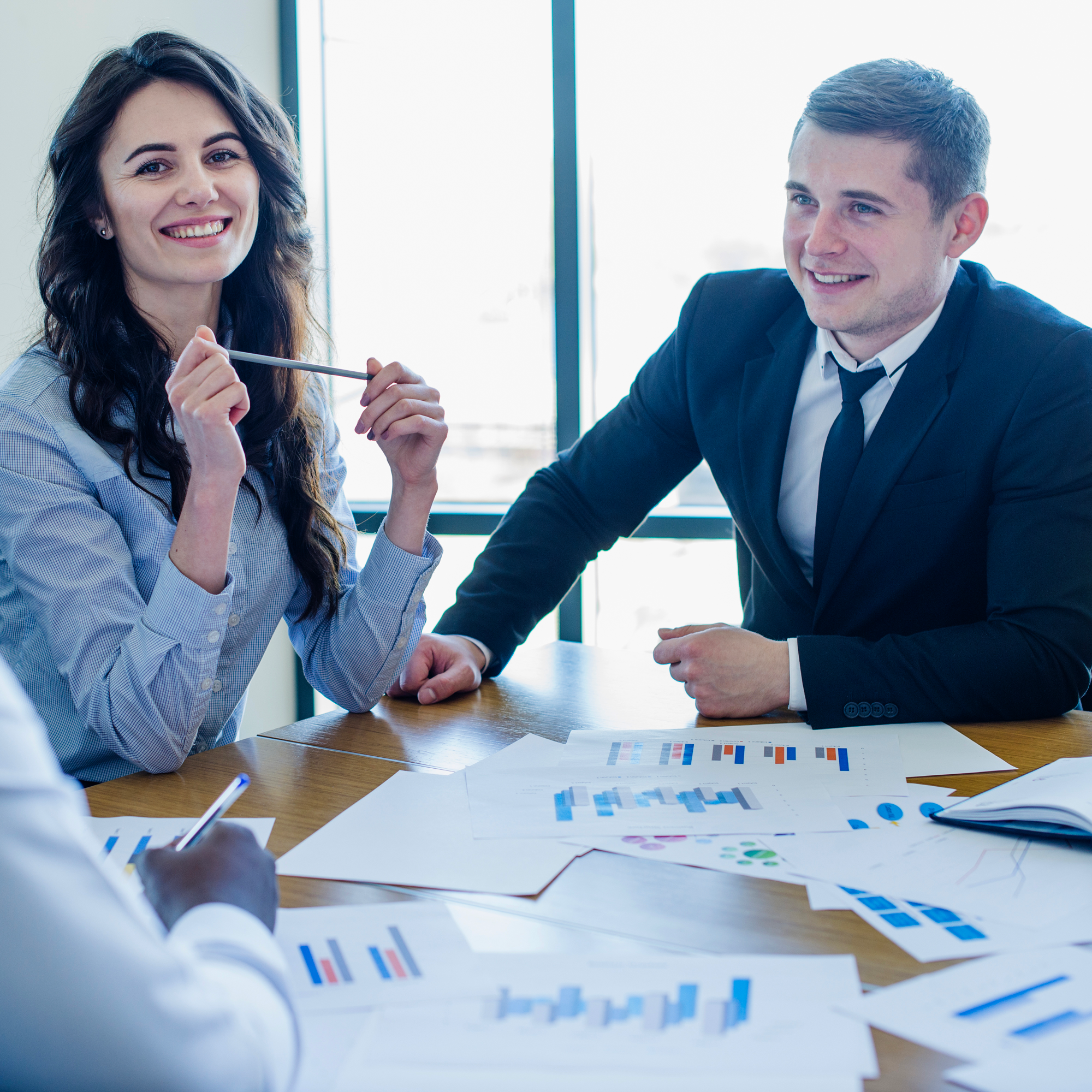 three-businesspersons-meeting